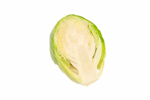 Brussels sprouts on a white background. Fresh small Brussels sprouts, cut in half, Brussels sprouts texture.