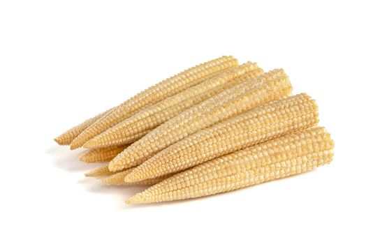 Corn on a white background. Baby corn isolated on white homogeneous background, clipping path, full depth of field