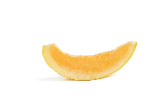 Melon on a white background. Yellow melon on a white isolate. Fresh juicy piece of melon with shadow on a white background. For insertion into a project, design or advertisement.