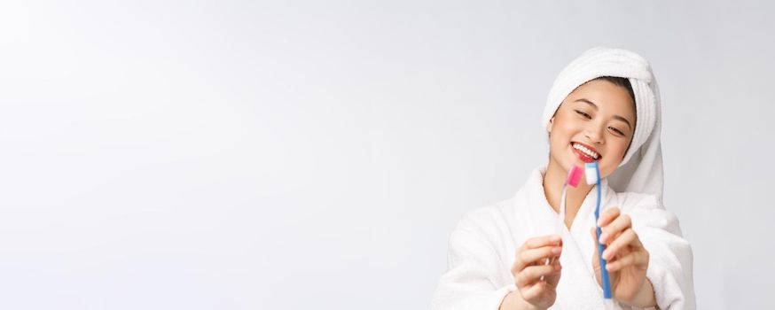 Close up of Smile woman brush teeth. great for health dental care concept, Isolated over white background. asian