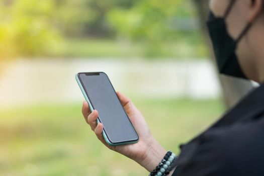 Woman hand using smartphone to do work business, social network, communication concept.