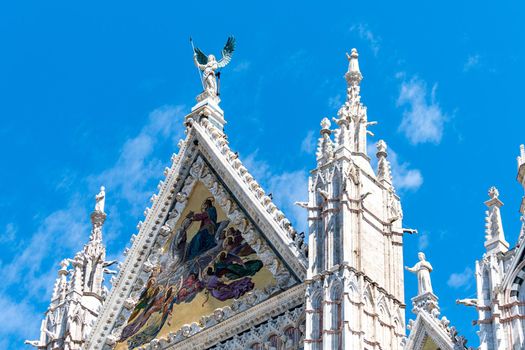 facade of the cathedral of siena in piazza duomo