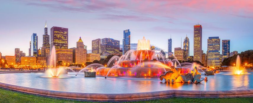 Panorama of Chicago skyline  with skyscrapers and Buckingham fountain at sunset