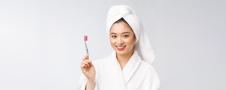 Close up of Smile woman brush teeth. great for health dental care concept, Isolated over white background. asian