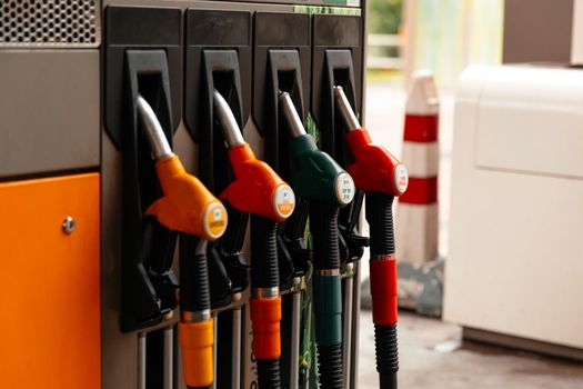 Horizontal shot of some fuel pumps at a gas station. Fuel dispensing pump,