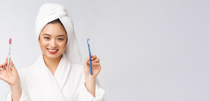 Close up of Smile woman brush teeth. great for health dental care concept, Isolated over white background. asian