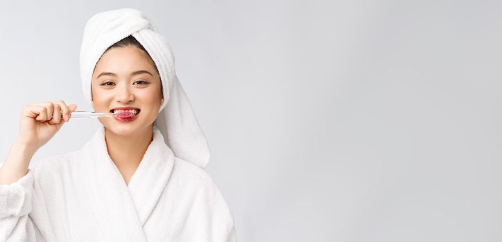 Close up of Smile woman brush teeth. great for health dental care concept, Isolated over white background. asian