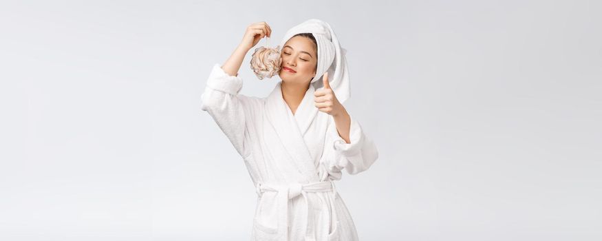 Asian woman being happy with the shower. Studio concept.