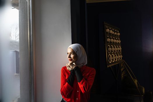 Portrait of muslim woman weared in traditional islamic scarf. Islam religion