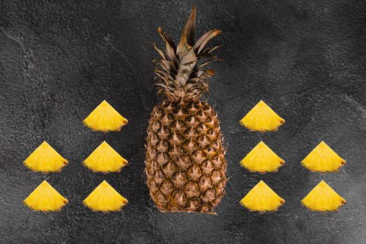 Pineapple tropical fruit on dark stone background background. Citrus fruit with vitamin c for helth care