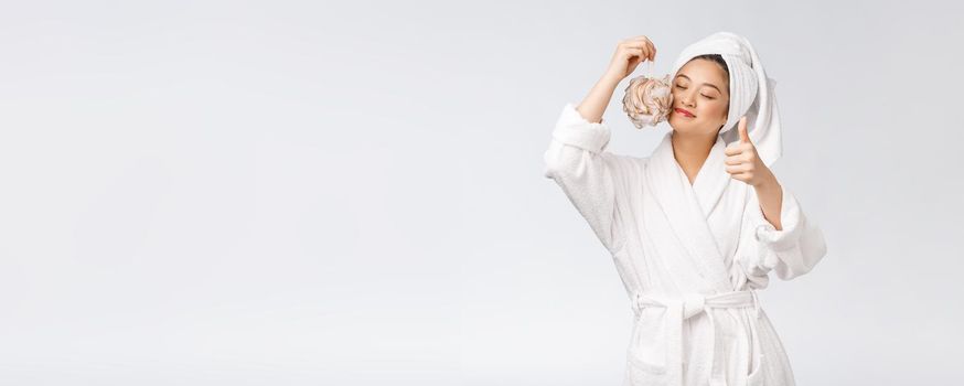 Asian woman being happy with the shower. Studio concept.