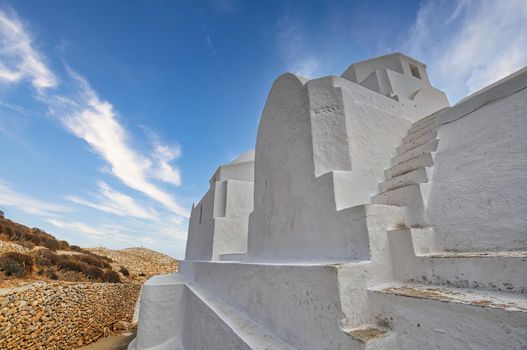 Panagia church, traditional orthodox church with white dome in Folegandros in Greece..