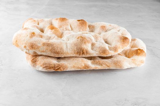 Dough for pinsa romana on light background. Gourmet italian cuisine