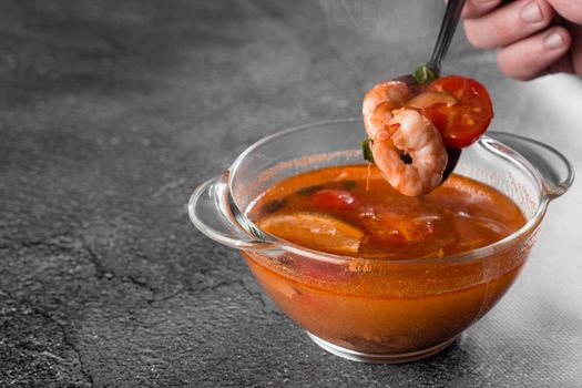 Tom yam soup with shrimps traditional thai dish. Tom yum spicy and sour soup with shrimp, chicken, fish or other seafood