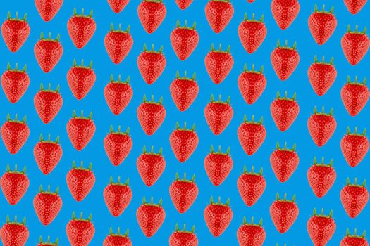 Strawberry pattern on blue background. Seasonal berry.
