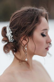 Wedding jewelry on the bride's head. Winter