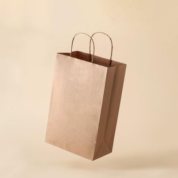 Cardboard brown levitation paper bag for shop shopping and business mockup. The concept of minimal purchase, sale and delivery of product and recycling.