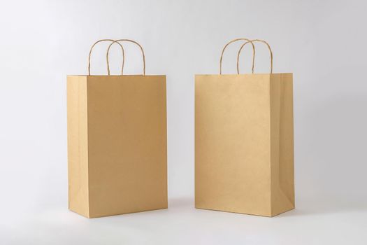 Two blank paper cardboard container packs for commercial shopping marketing and shipping.