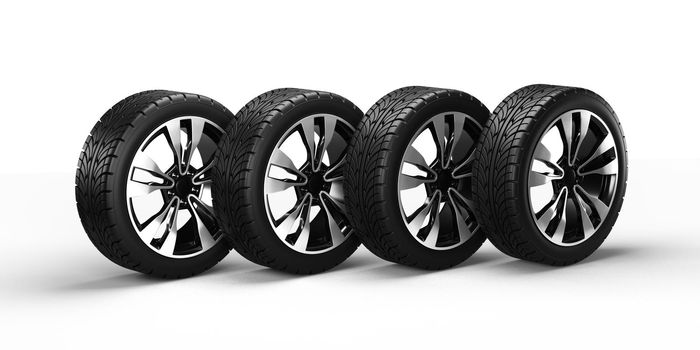 Four car wheels isolated on white background, in a row, 3D rendering illustration.