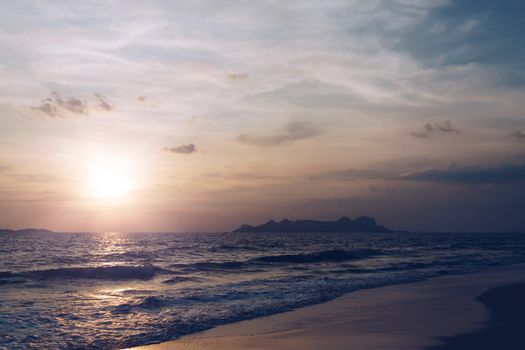 Tropical nature clean beach sunset sky time with sun light background.