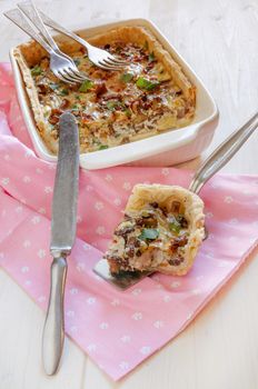 Homemade mushroom pie in white baking dish. From series Natural organic food