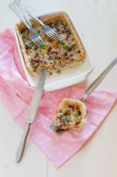 Homemade mushroom pie in white baking dish. Overhead view. From series Natural organic food