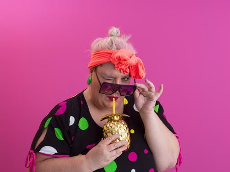 Overweight plus size female, fat women, Fat girl, Chubby, holding golden fruit ananas isolated on pink background - lifestyle Woman diet weight loss overweight problem concept. High quality photo