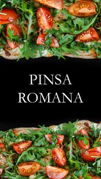 Pinsa romana gourmet italian cuisine on black background. Scrocchiarella. Pinsa with meat, arugula, tomatoes, cheese
