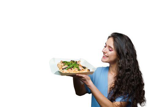 Girl courier with pinsa romana and scrocchiarella gourmet italian cuisine on white background. Holding traditional dish. Food delivery from pizzeria. Pinsa with meat, arugula, olives, cheese