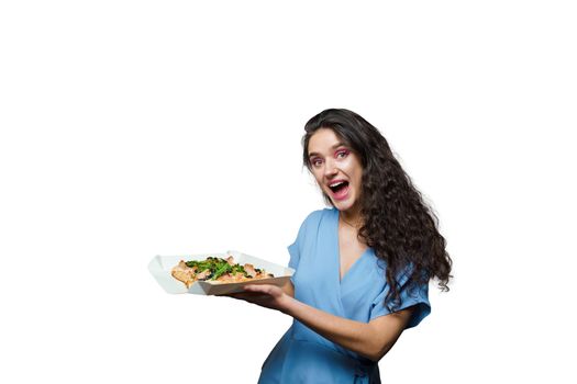 Girl courier with pinsa romana and scrocchiarella gourmet italian cuisine on white background. Holding traditional dish. Food delivery from pizzeria. Pinsa with meat, arugula, olives, cheese