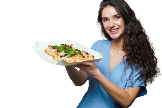 Girl courier with pinsa romana and scrocchiarella gourmet italian cuisine on white background. Holding traditional dish. Food delivery from pizzeria. Pinsa with meat, arugula, olives, cheese