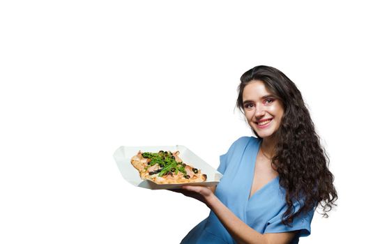 Girl courier with pinsa romana and scrocchiarella gourmet italian cuisine on white background. Holding traditional dish. Food delivery from pizzeria. Pinsa with meat, arugula, olives, cheese
