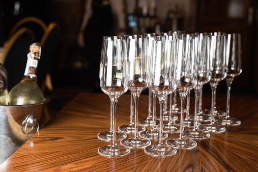 Wine glasses on the table in restaurant. Aperetif before party