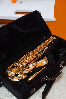 Saxophone musician instrument in case. Sax musical instrument for play jazz