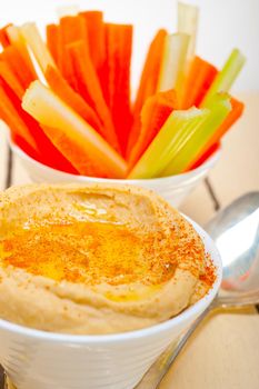 fresh hummus dip with raw carrot and celery arab middle eastent healthy food 