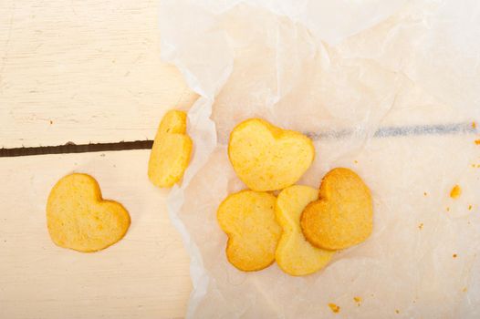 fresh baked heart shaped shortbread valentine day cookies on a paper wrap