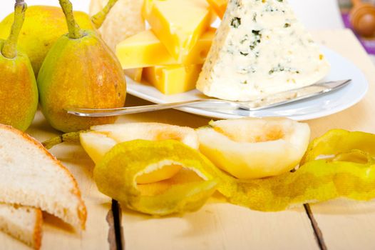 selection of cheese and fresh pears appetizer snack