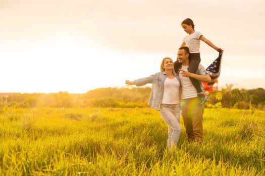 Summer, American Family with United States Flag.