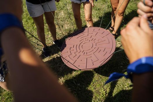 Teambuilding game for group of people for getting team spirit and increase friendship for colleagues. Labyrinth game for group of people.