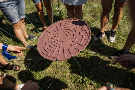 Teambuilding game for group of people for getting team spirit and increase friendship for colleagues. Labyrinth game for group of people.