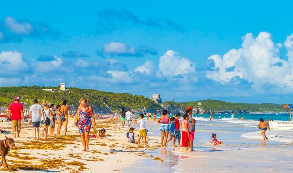 Tulum Mexico 02. February 2022 Amazing and beautiful caribbean coast and beach panorama view with turquoise water people and boats of Tulum in Quintana Roo Mexico.