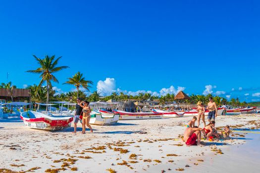 Tulum Mexico 02. February 2022 Amazing and beautiful caribbean coast and beach panorama view with turquoise water people and boats of Tulum in Quintana Roo Mexico.