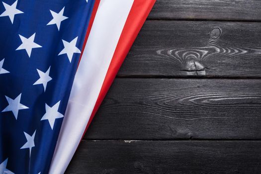 USA flag on dark wooden table background. creative photo.