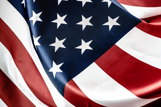 Beautifully waving star and striped American flag. creative photo.