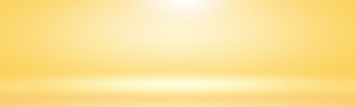 Abstract solid of shining yellow gradient studio wall room background