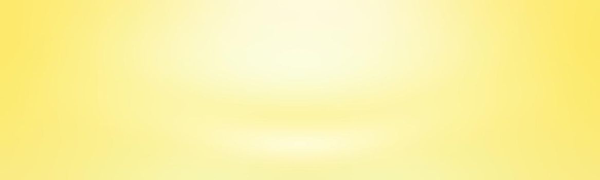 Abstract solid of shining yellow gradient studio wall room background