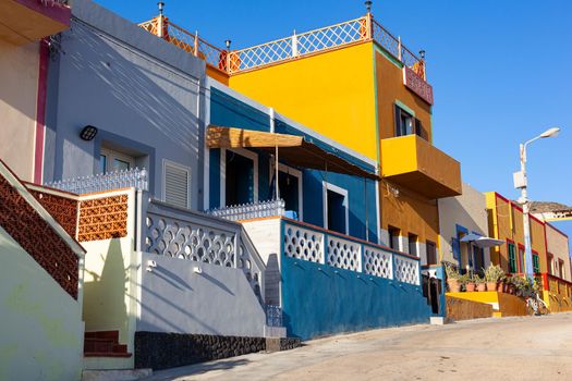 View of the typical Linosa house painted with yellow and red colors in the summer season. Linosa is one of the Pelagie Islands in the Sicily Channel of the Mediterranean Sea