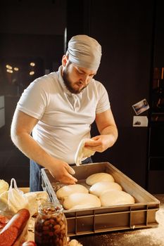 Pizza dough in a box, cheking yeast rise