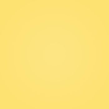 Abstract solid of shining yellow gradient studio wall room background