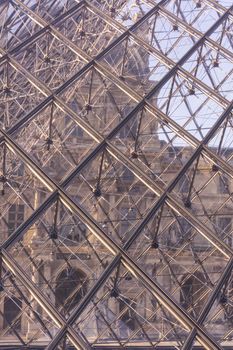 Louvre glass pyramid close up in Paris, France